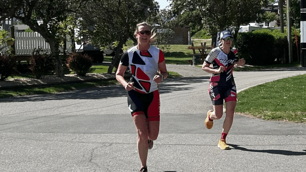 Two women racing to the finish line.